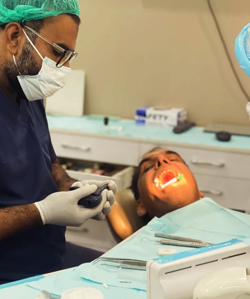 Smile Care clinical team performing a dental procedure